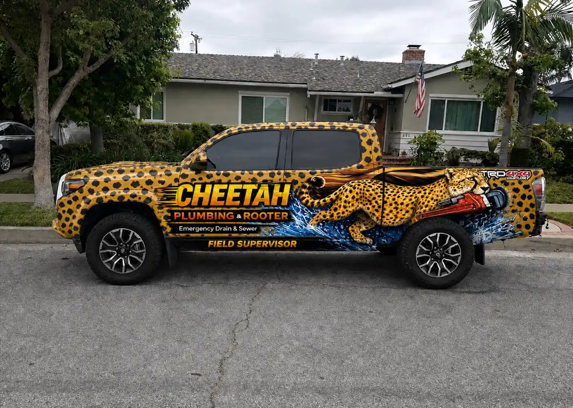 Cheetah Plumbing & Rooter field supervisor truck wrapped in cheetah print