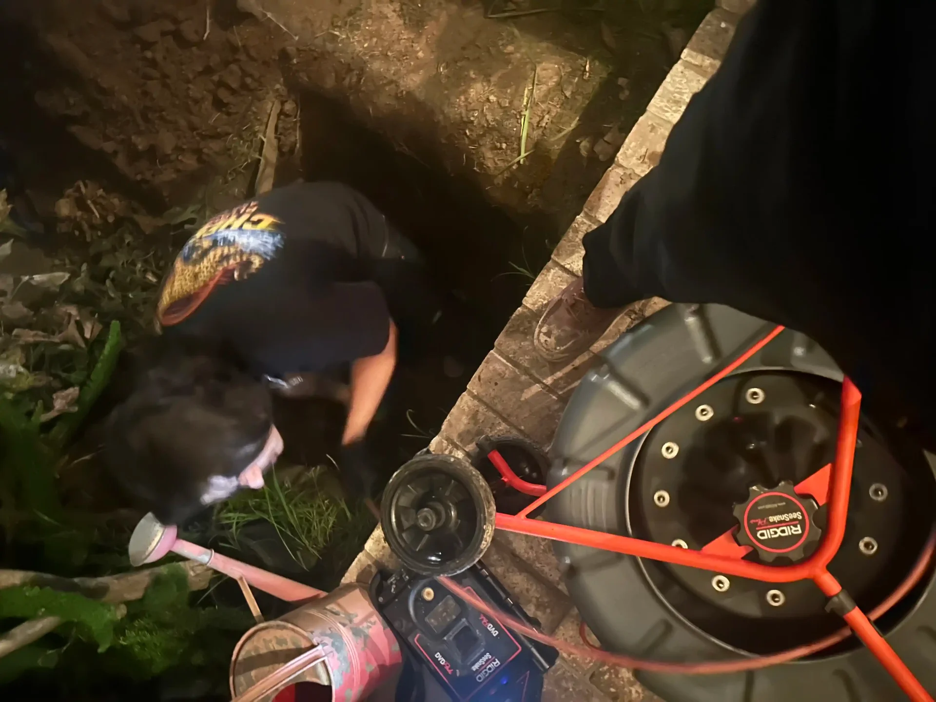 Late-night RIDGID SeeSnake sewer camera inspection
